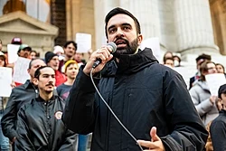 Zohran Mamdani speaking at a rally in Queens during his New York City mayoral campaign, 2025.