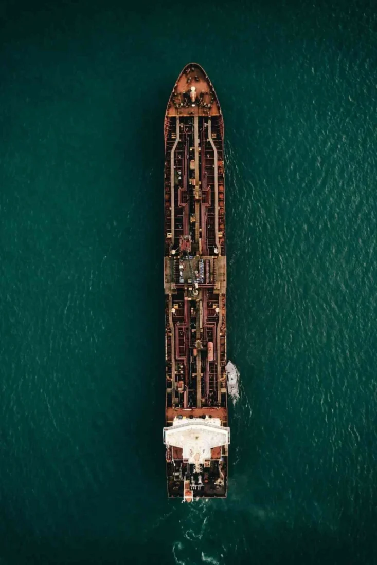 Aerial view of an oil tanker at sea amid US monitoring of vessels linked to Venezuela’s sanctioned oil trade.
