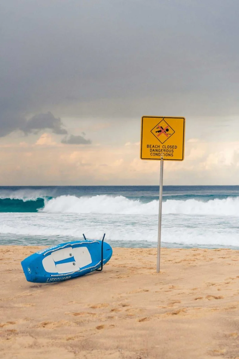 Beach warning signs and patrols in Australia following increased shark activity after heavy rainfall