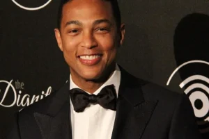 Don Lemon, former CNN anchor, standing at a public event
