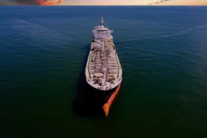 Large crude oil tanker transporting oil across the sea representing global energy supply and shipping routes