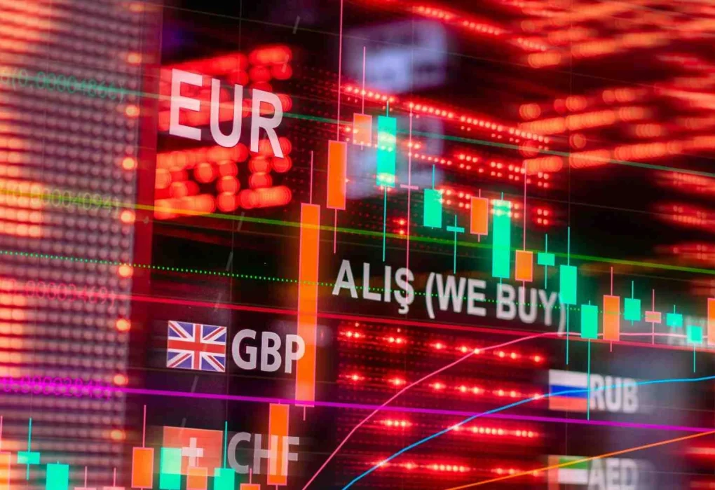 Global stock market trading screen showing EUR currency and red candlestick price charts during a market decline
